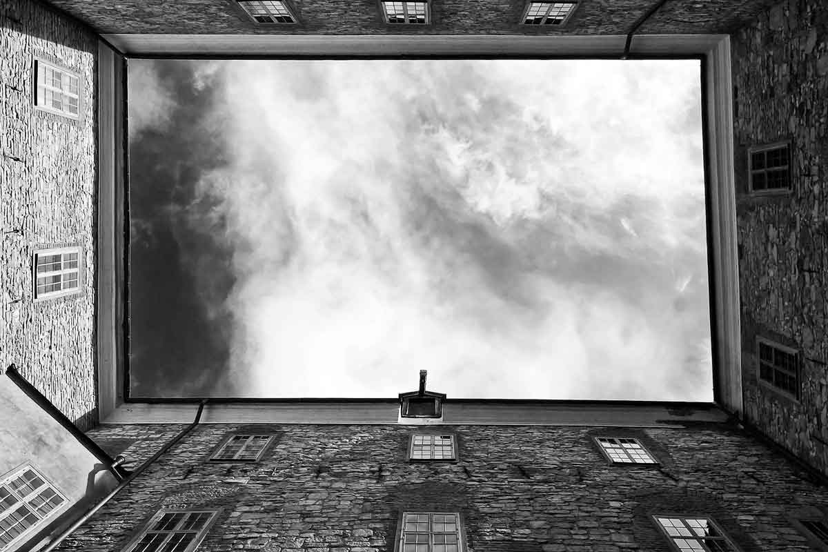 black and white photo of a brick building