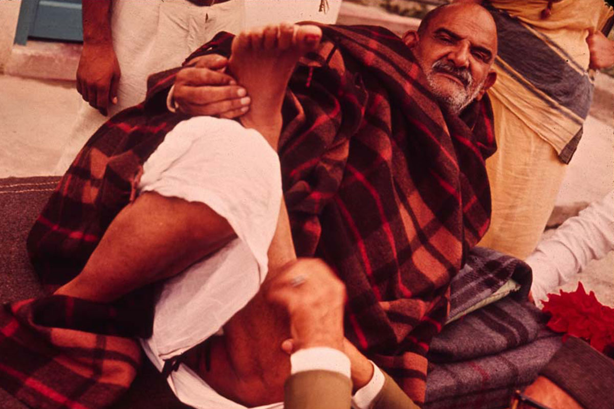 neem karoli baba with plaid blanket