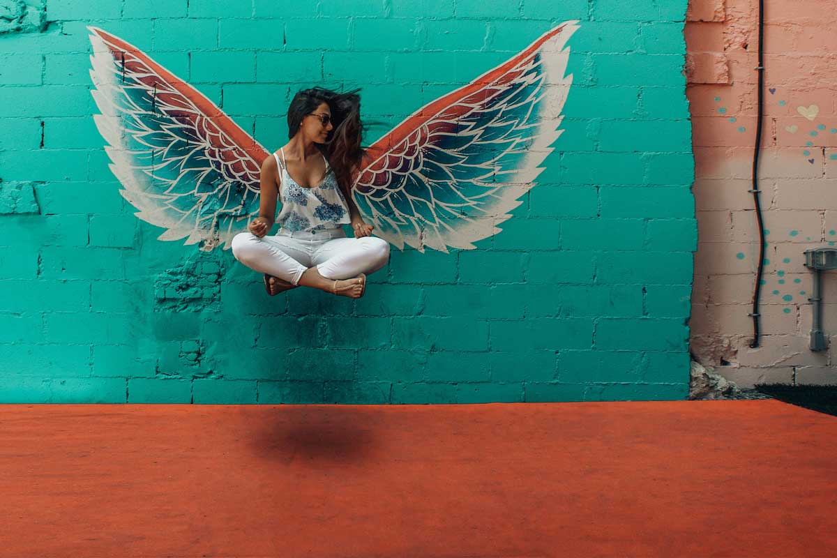 woman in lotus floating in the air