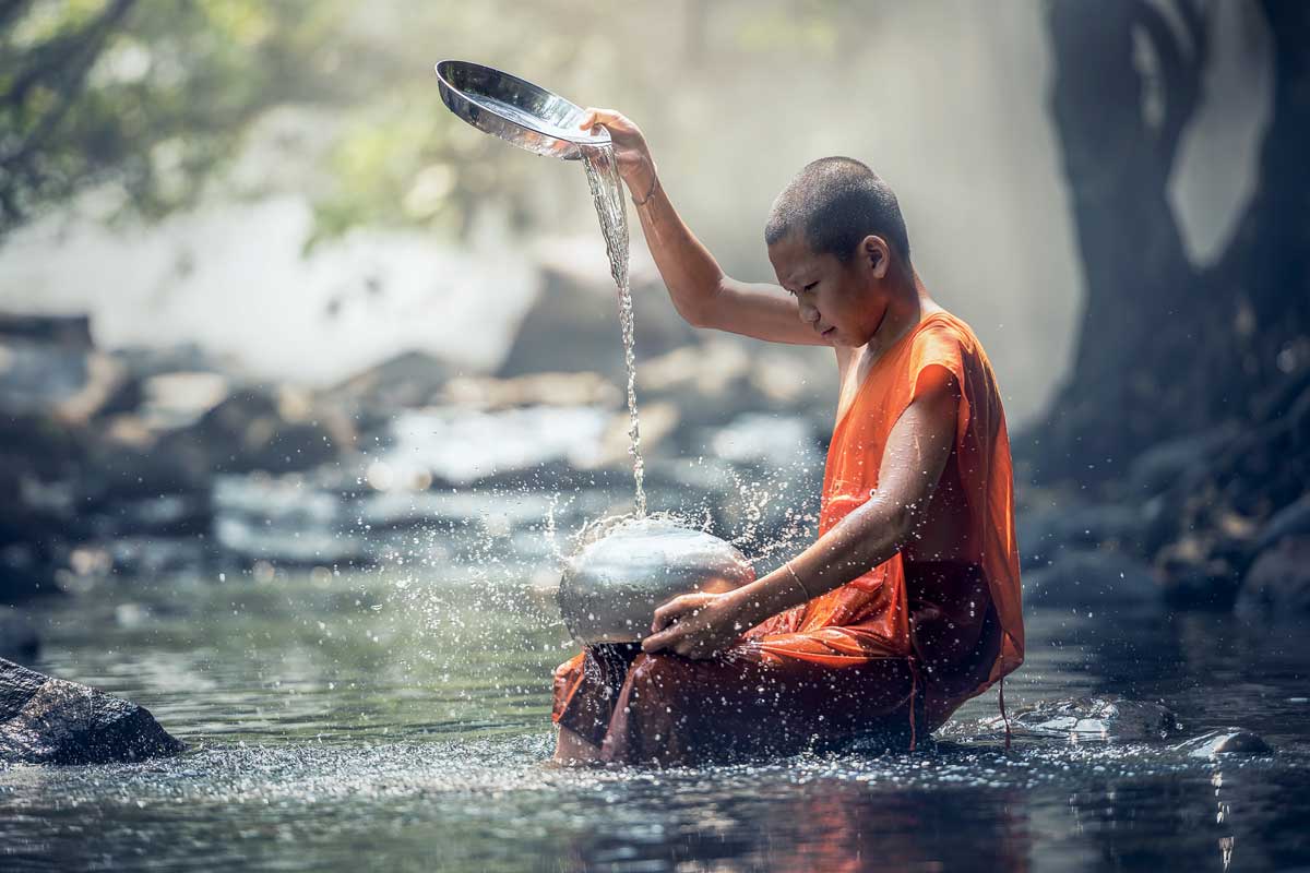 boy in river love compassion