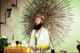 Ram Dass sitting in thought