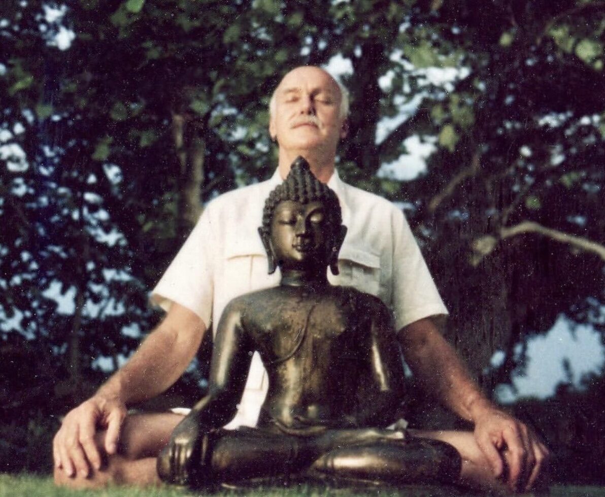Ram Dass Meditation with Buddha Statue